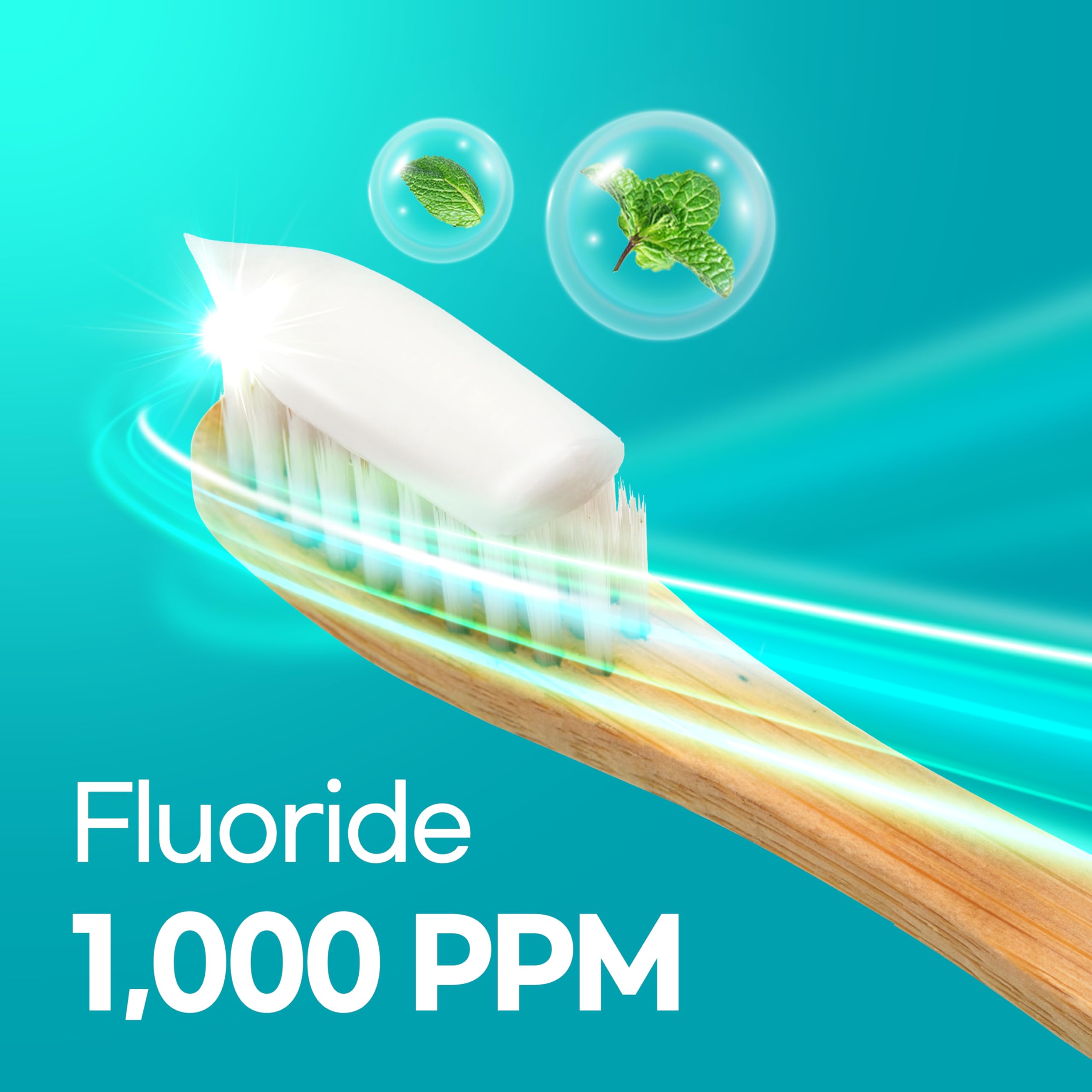 Close-up of toothpaste label showing Herbal Mint and fluoride information