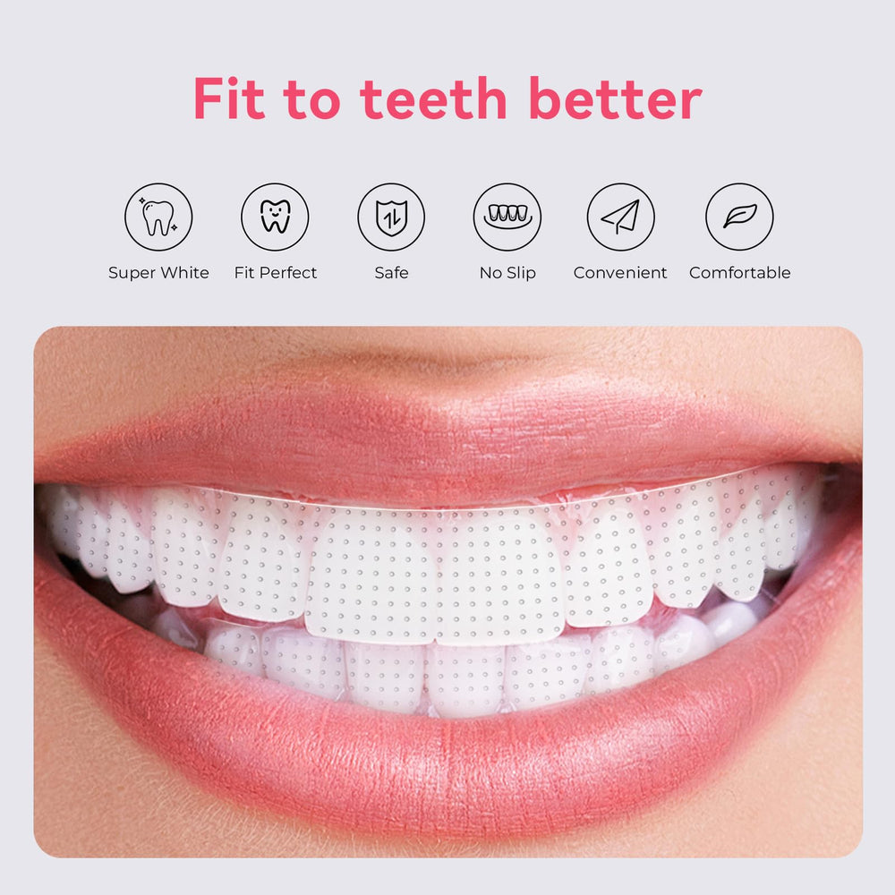 Whitening strip being applied to upper teeth