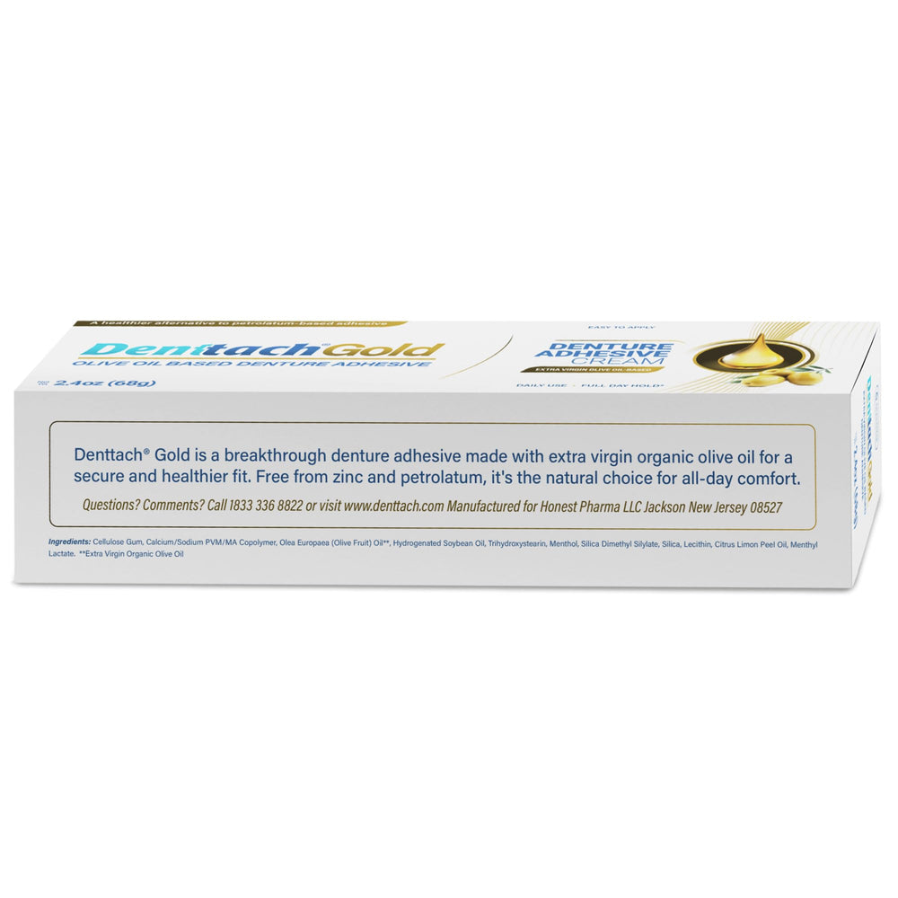 Close-up of Denttach Gold packaging for denture adhesive