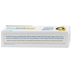 Close-up of Denttach Gold packaging for denture adhesive