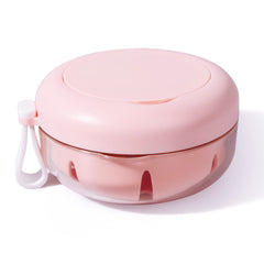 Pink denture case with mirror and travel-ready design