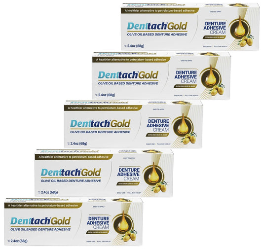 Denttach Gold olive oil-based denture adhesive bottle front view, 2.4 oz
