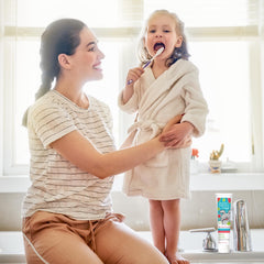 Desert Essence toothpaste by sink encouraging kid brushing routine and appeal