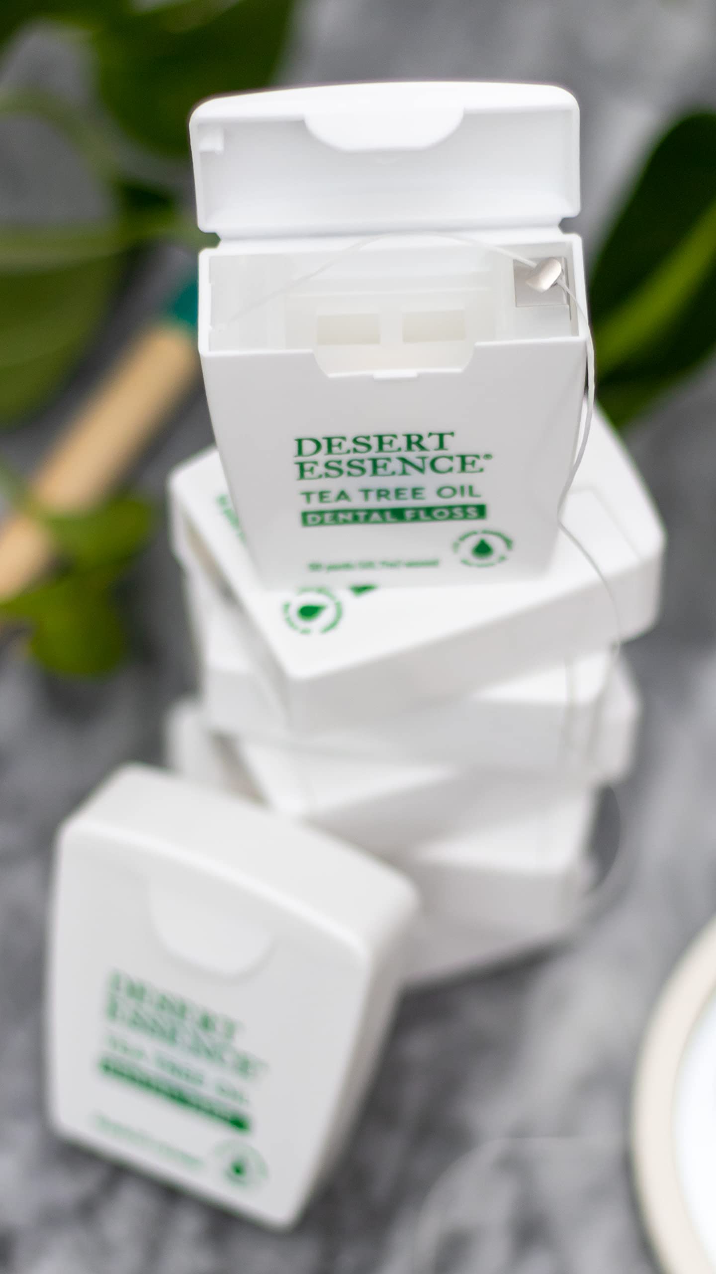 Tea tree oil antiseptic dental floss close-up
