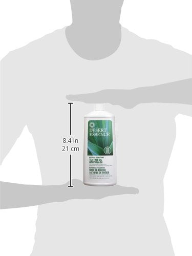 Side view of Desert Essence Tea Tree Oil Mouthwash bottle on a clean surface