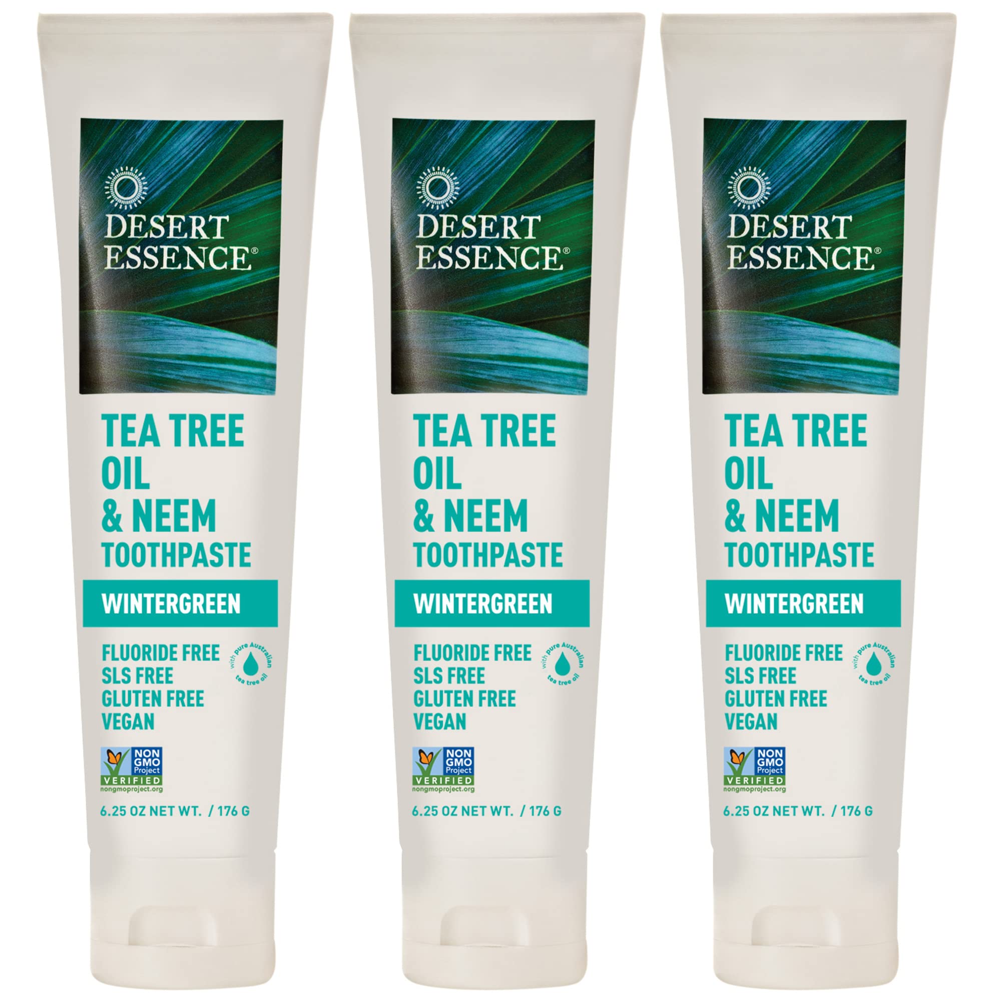 Desert Essence toothpaste 3-pack box and tubes on white background