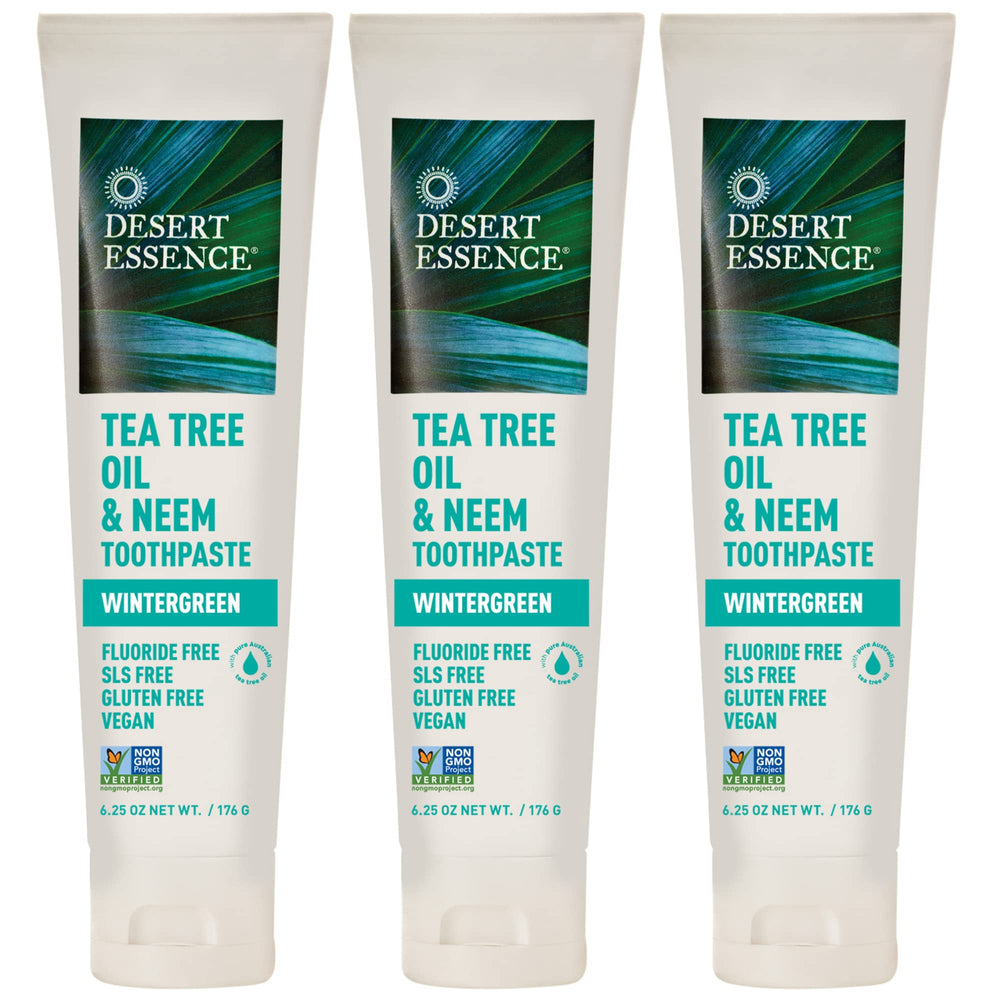 Desert Essence toothpaste 3-pack box and tubes on white background