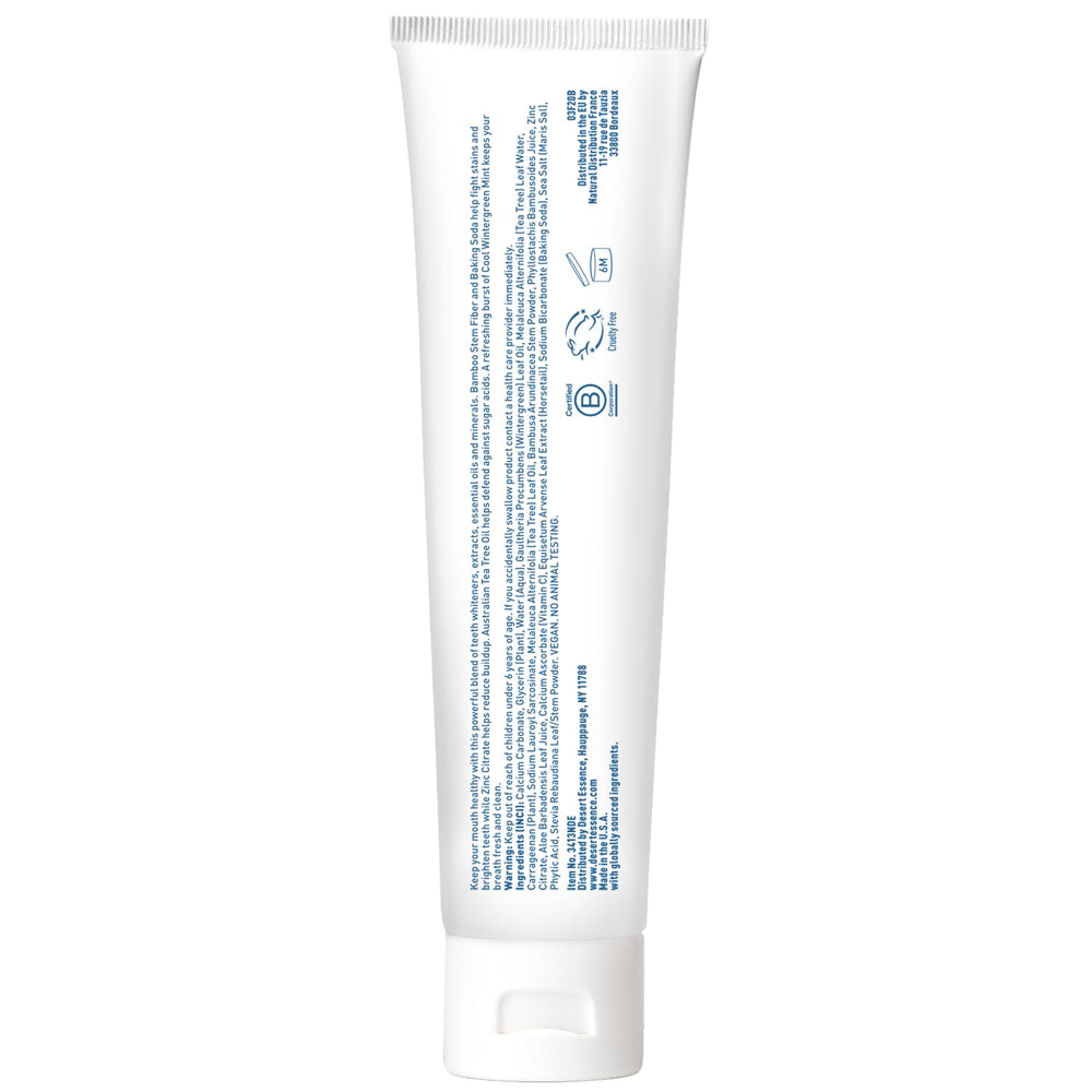 Vegan and gluten-free symbols on toothpaste packaging