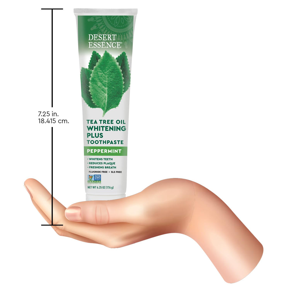 Brushing with Desert Essence toothpaste for fresh peppermint breath