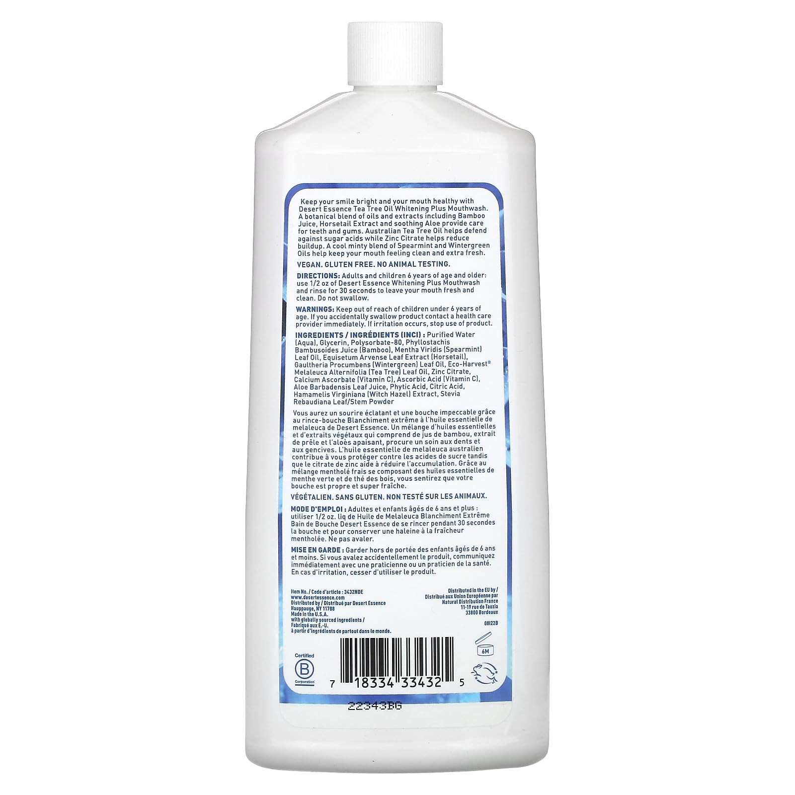 Front view of Desert Essence Tea Tree Whitening Mint Mouthwash bottle with packaging 16 oz