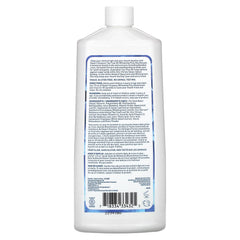 Front view of Desert Essence Tea Tree Whitening Mint Mouthwash bottle with packaging 16 oz