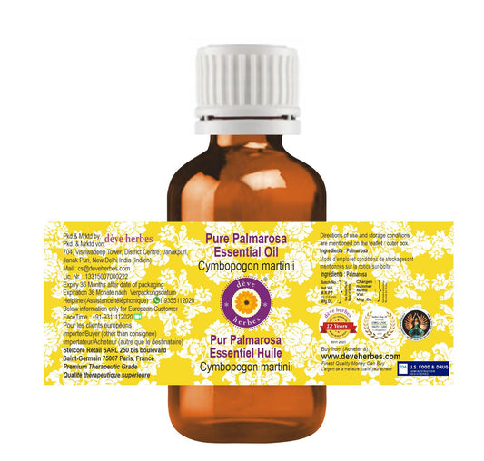 Close-up of Palmarosa essential oil in amber bottle