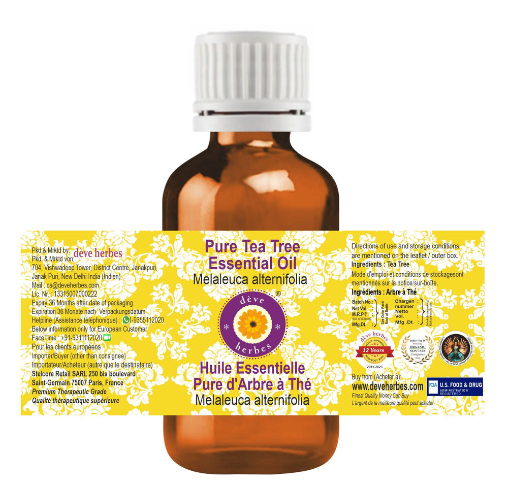 Close-up of amber glass bottle with Tea Tree Essential Oil label