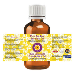 Close-up of amber glass bottle with Tea Tree Essential Oil label