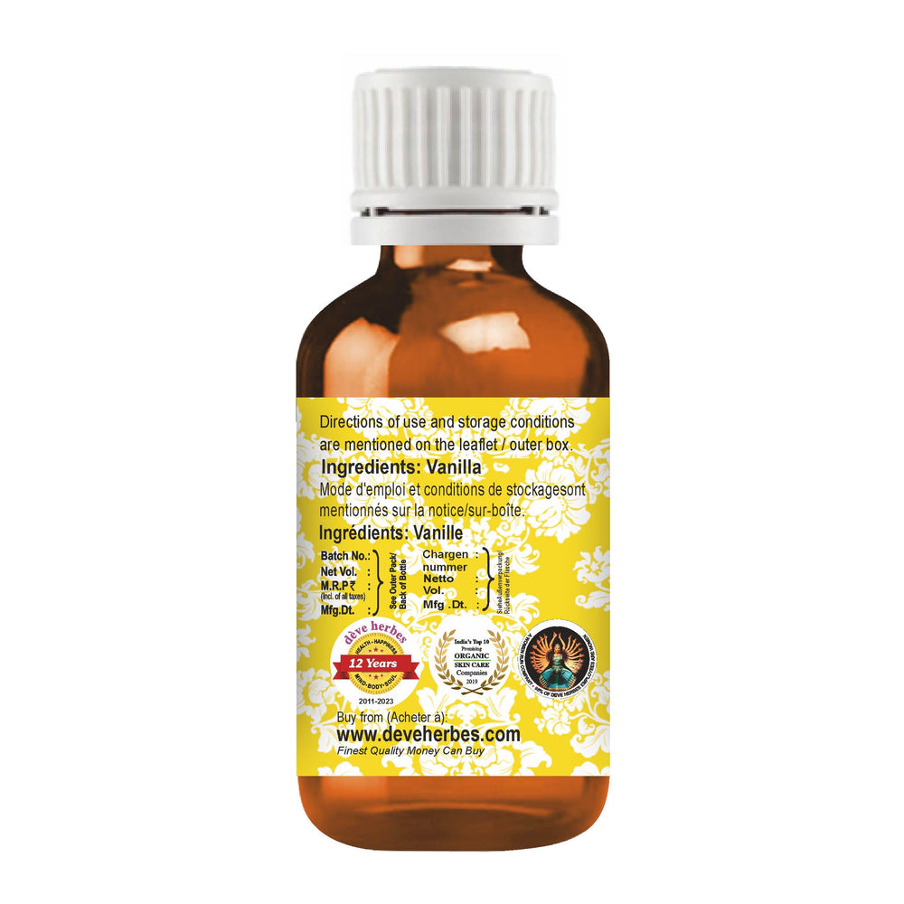 Close-up of dropper cap on vanilla essential oil bottle