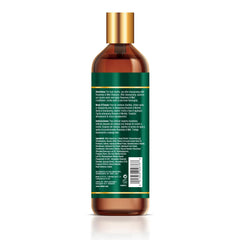 Difeel Elevated Rosemary Mint Conditioner pump in hand shows convenient dispensing for easy use.