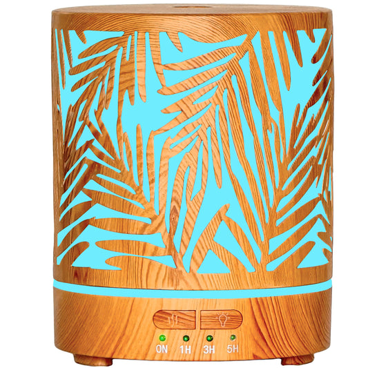 Front view of essential oil diffuser with water plants design and metal cover