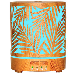 Front view of essential oil diffuser with water plants design and metal cover