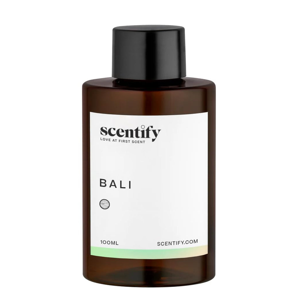 Scentify Bali diffuser oil with amber, musk and woody accords for a calming space.
