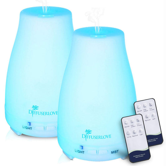 Diffuserlove 2-pack 200ml essential oil diffusers on a nightstand