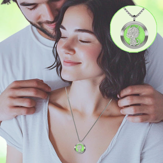 Back view showing engraved text on dinosaur diffuser necklace