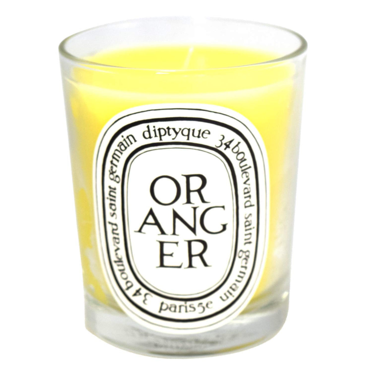 Diptyque Oranger candle label closeup for premium ambiance.