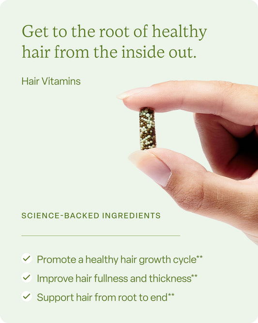 Close-up of Divi Hair Vitamins capsules