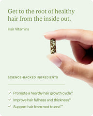 Close-up of Divi Hair Vitamins capsules