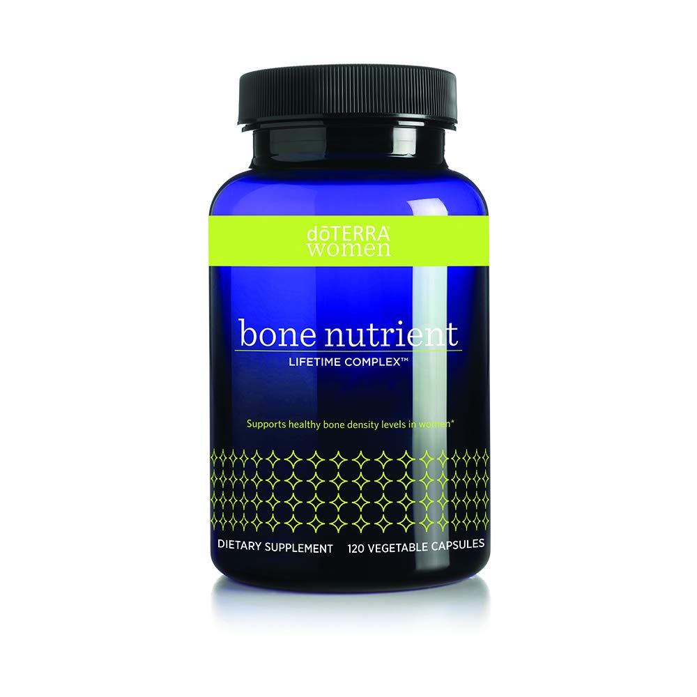 Bottle of doTERRA Bone Nutrient Lifetime Complex for Women with label showing vitamins C and D, calcium, magnesium, and trace minerals