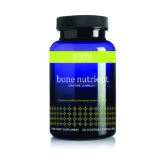 Bottle of doTERRA Bone Nutrient Lifetime Complex for Women with label showing vitamins C and D, calcium, magnesium, and trace minerals