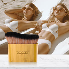 Docolor body shimmer and sunscreen application with precise blending.
