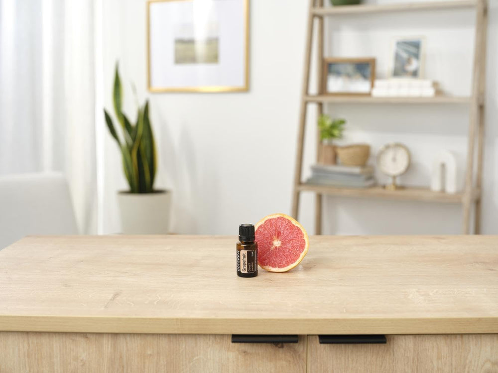 Two 15 ml bottles of doTERRA Grapefruit Essential Oil
