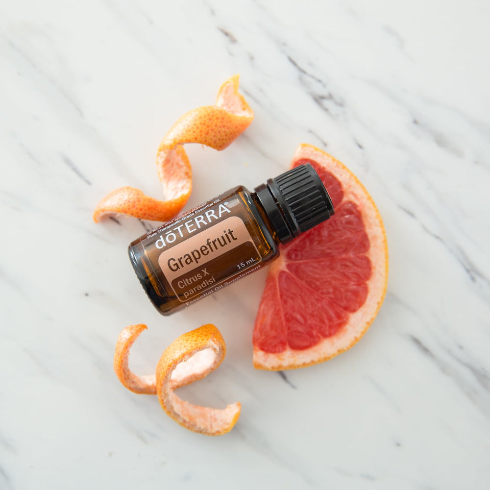 Grapefruit essential oil bottle with bright citrus setting
