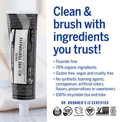 Anise-flavored toothpaste tube on white background