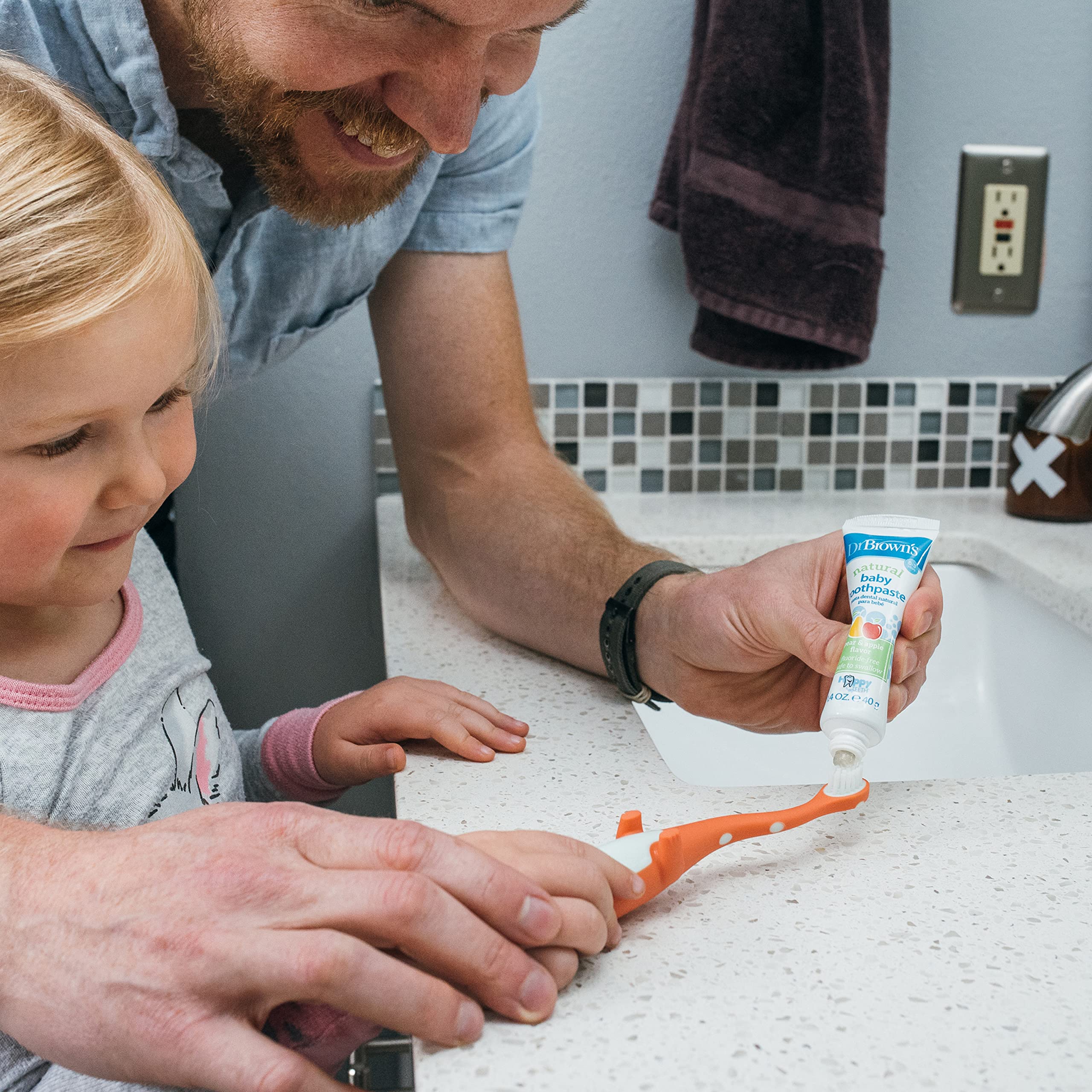Suction base provides upright storage for Dr. Brown's toothbrush