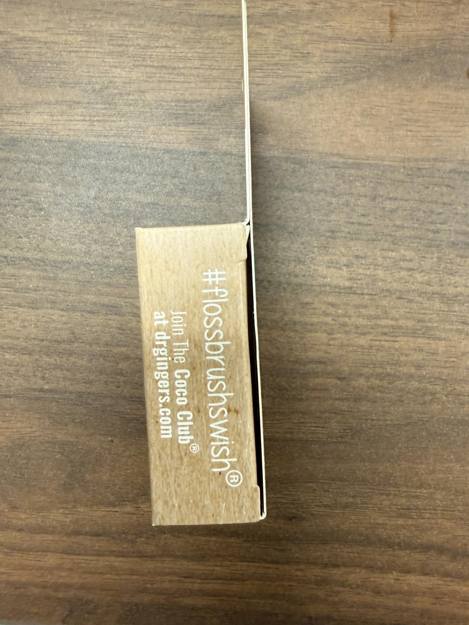Product bundle showing three-pack of Dr. Ginger's floss