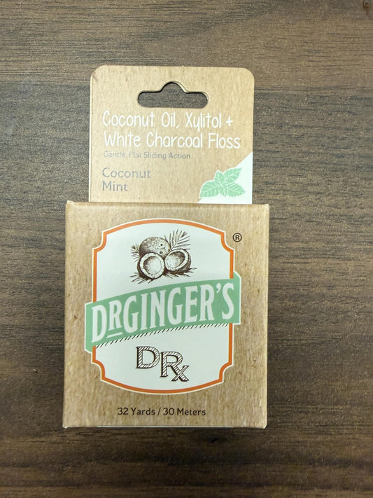 Close-up of charcoal dental floss strands