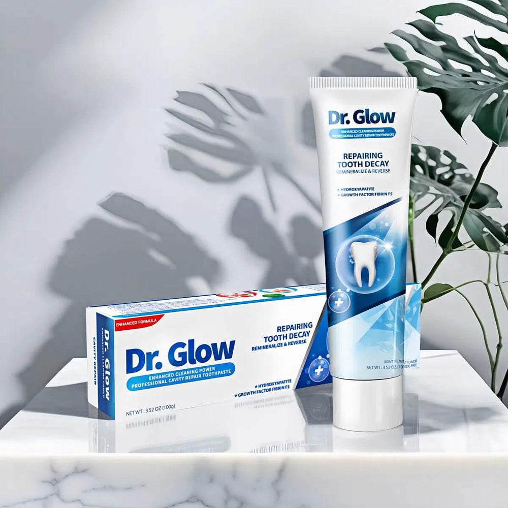 Tube of Dr. Glow toothpaste beside teeth
