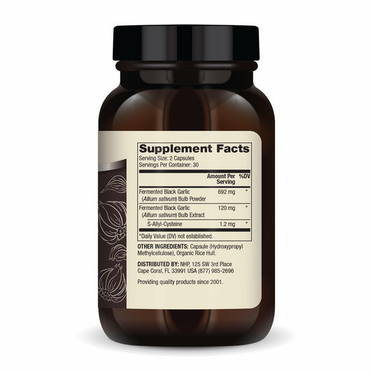 Close-up of fermented black garlic capsules