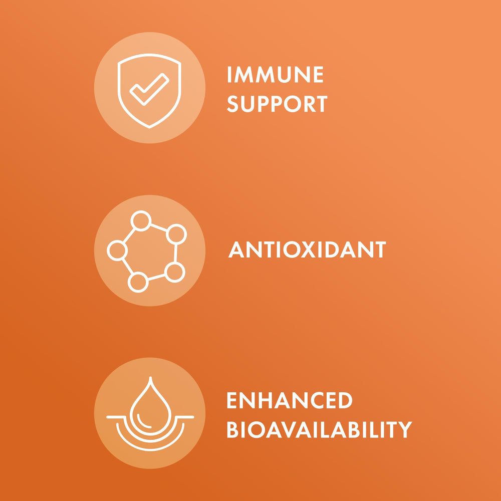 Pouring Dr. Mercola Liposomal Vitamin C into a glass for daily use.