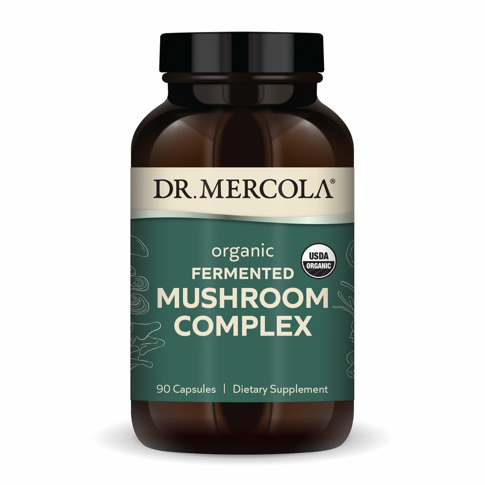 Dr. Mercola Organic Fermented Mushroom Complex bottle on countertop