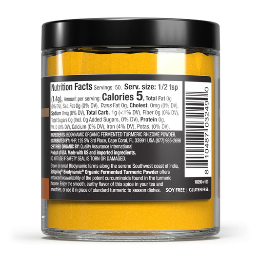 Close-up of turmeric powder in jar