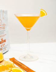 Lifestyle shot of DR. NIGMA Vitamin C Cocktail prepared in a glass