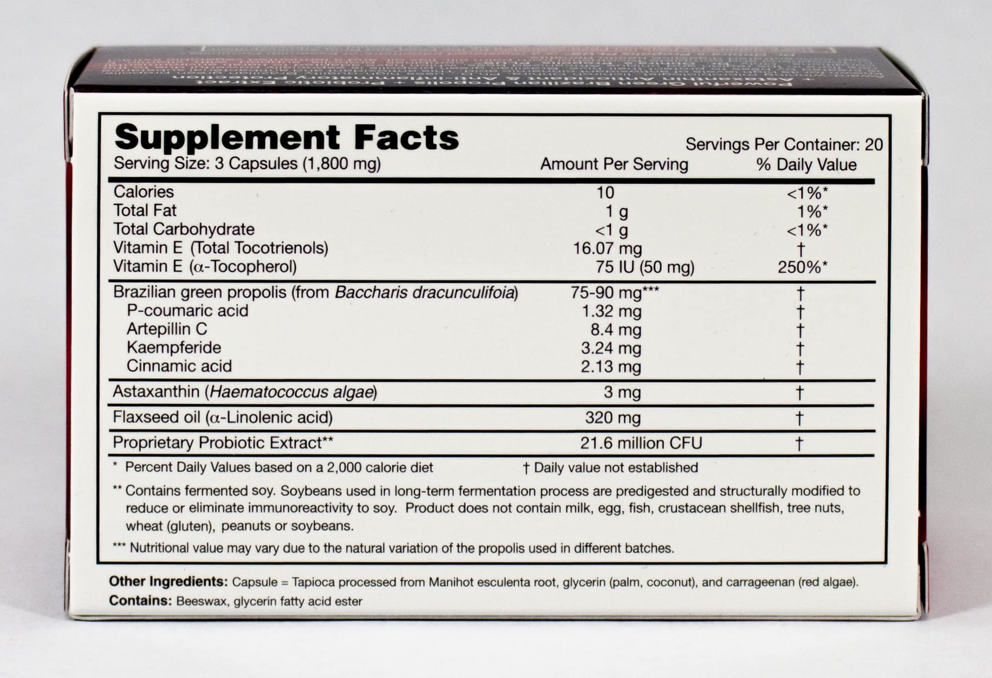Close-up of Brazilian Green Propolis and capsules