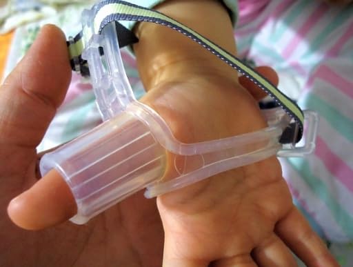 Side view of Dr. Thumb Thumb Guard highlighting safety design