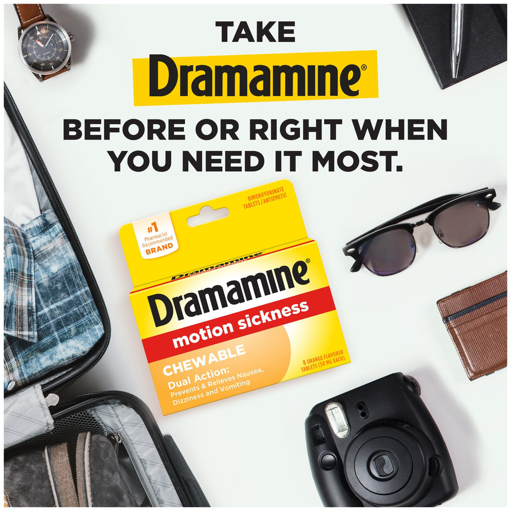 Dramamine orange chewables in hand for quick motion sickness relief.