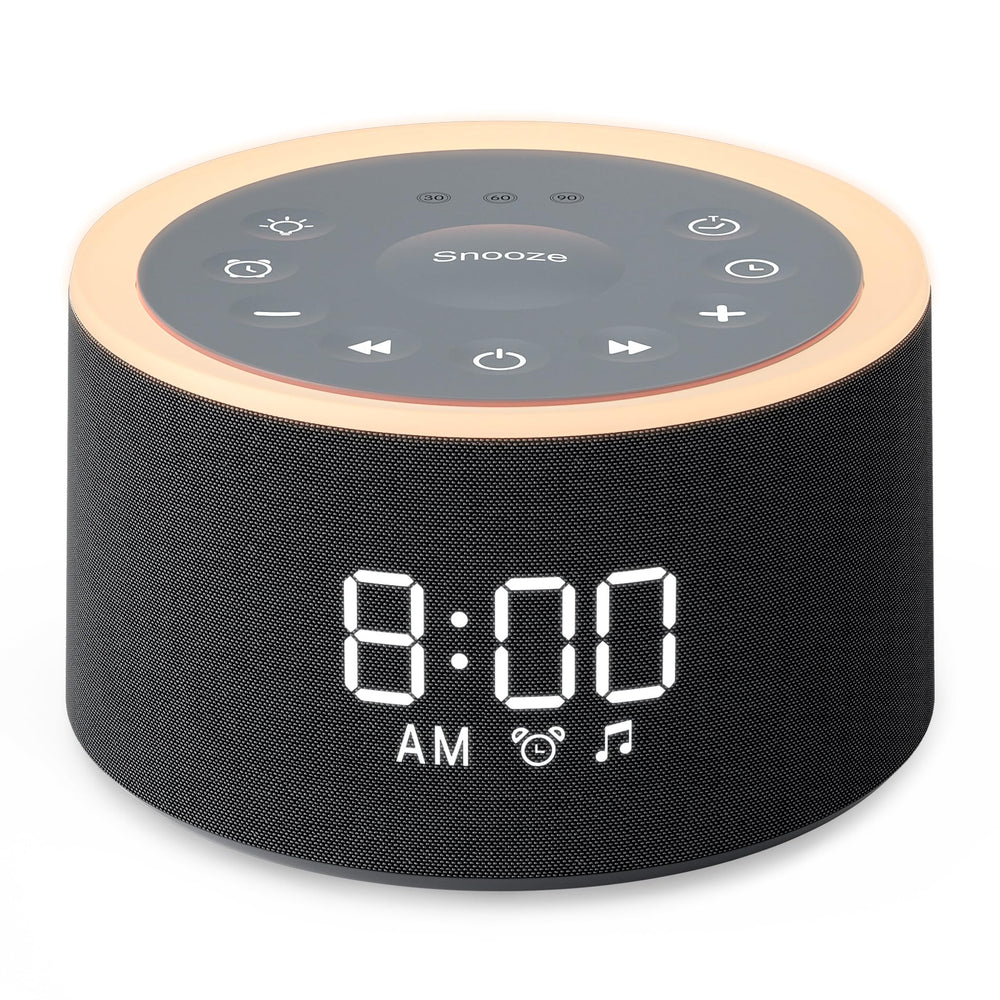 Dreamegg D1+ sleep sound machine on a bedside table providing calming sleep options