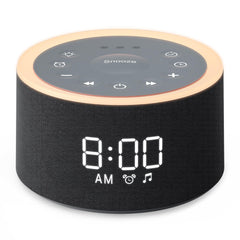 Dreamegg D1+ sleep sound machine on a bedside table providing calming sleep options