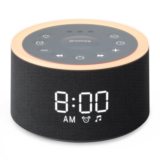 Dreamegg D1+ sleep sound machine on a bedside table providing calming sleep options