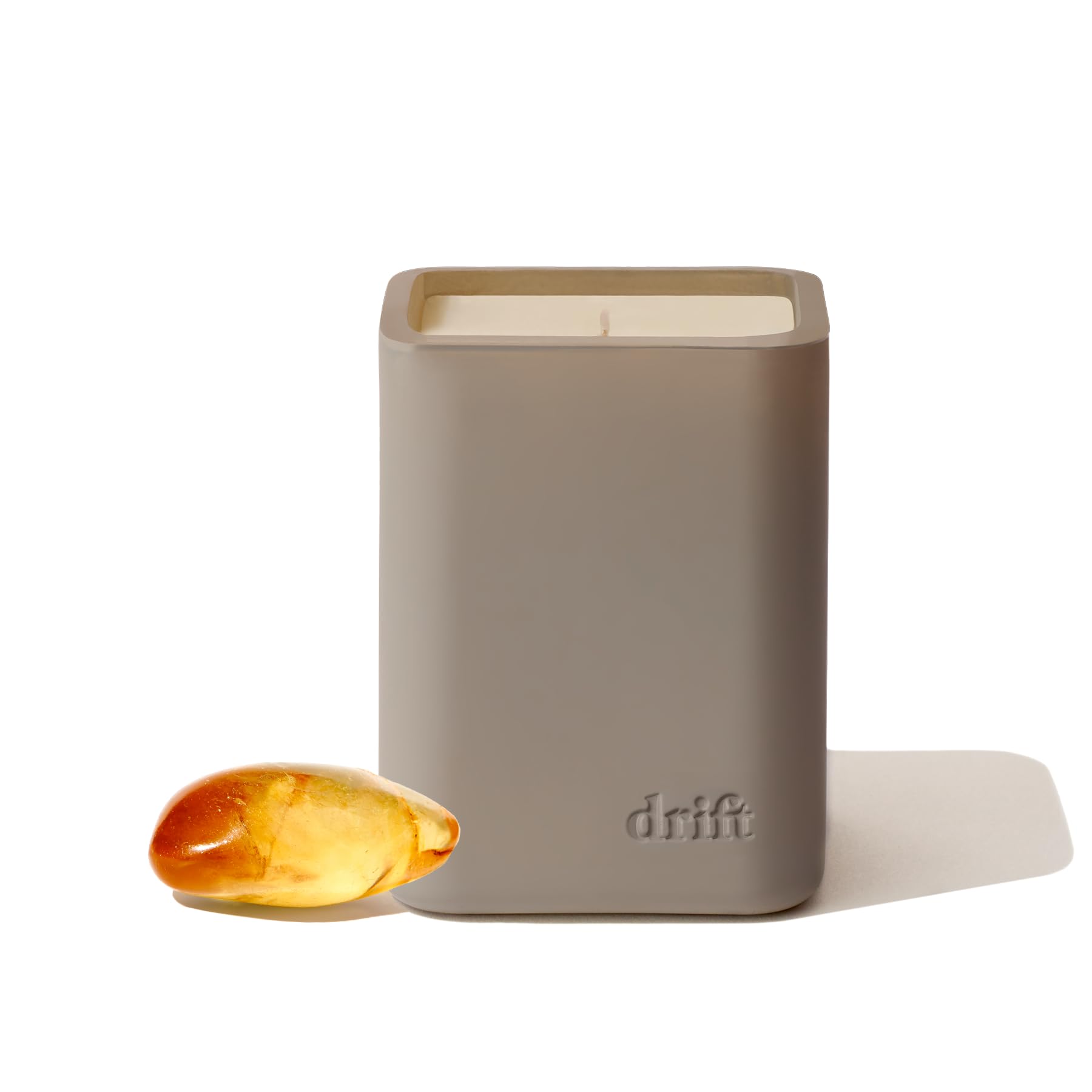 Drift Amber Scented Candle 10.5 oz tin - front view